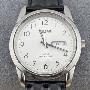 1990's Pulsar Solid Stainless Steel Watch with day and date at 3